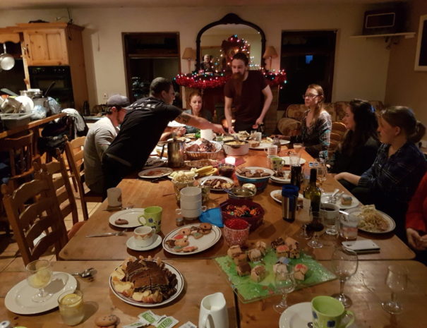 A group of guests we have over Christmas enjoying some home baked gingerbread and food