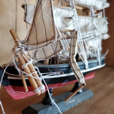 some of the trinkets and features laid about. this one shows a hand crafted little sailing boat