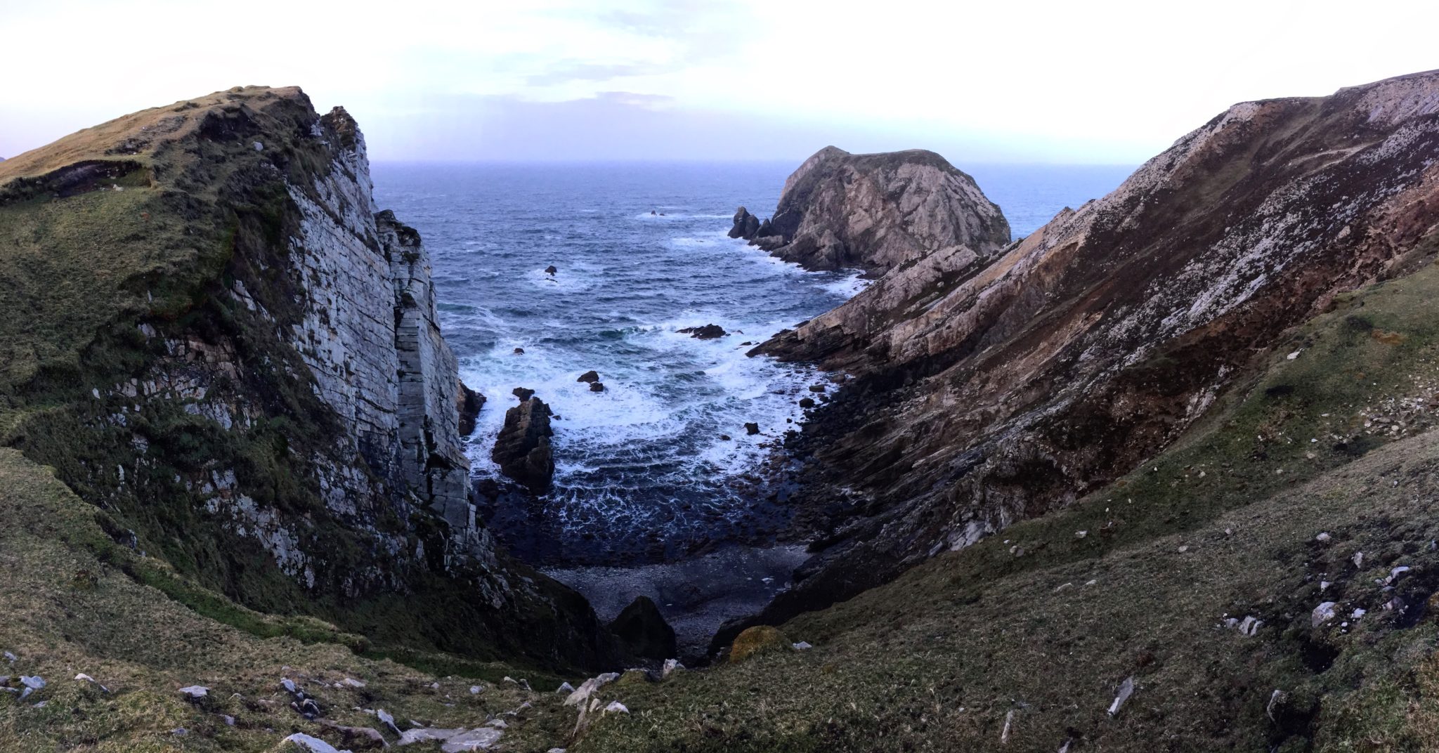 A sweeping rocky coastline at Port Donegal