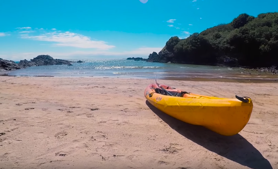 a kayak lies on the shore at Fintra Beach